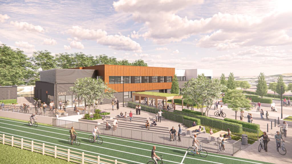 Visualisation of Bristol Regional Cycling Hub - track & building showing cyclists using the track, people sitting on beaches watching a cafe next to the main building and lots of trees